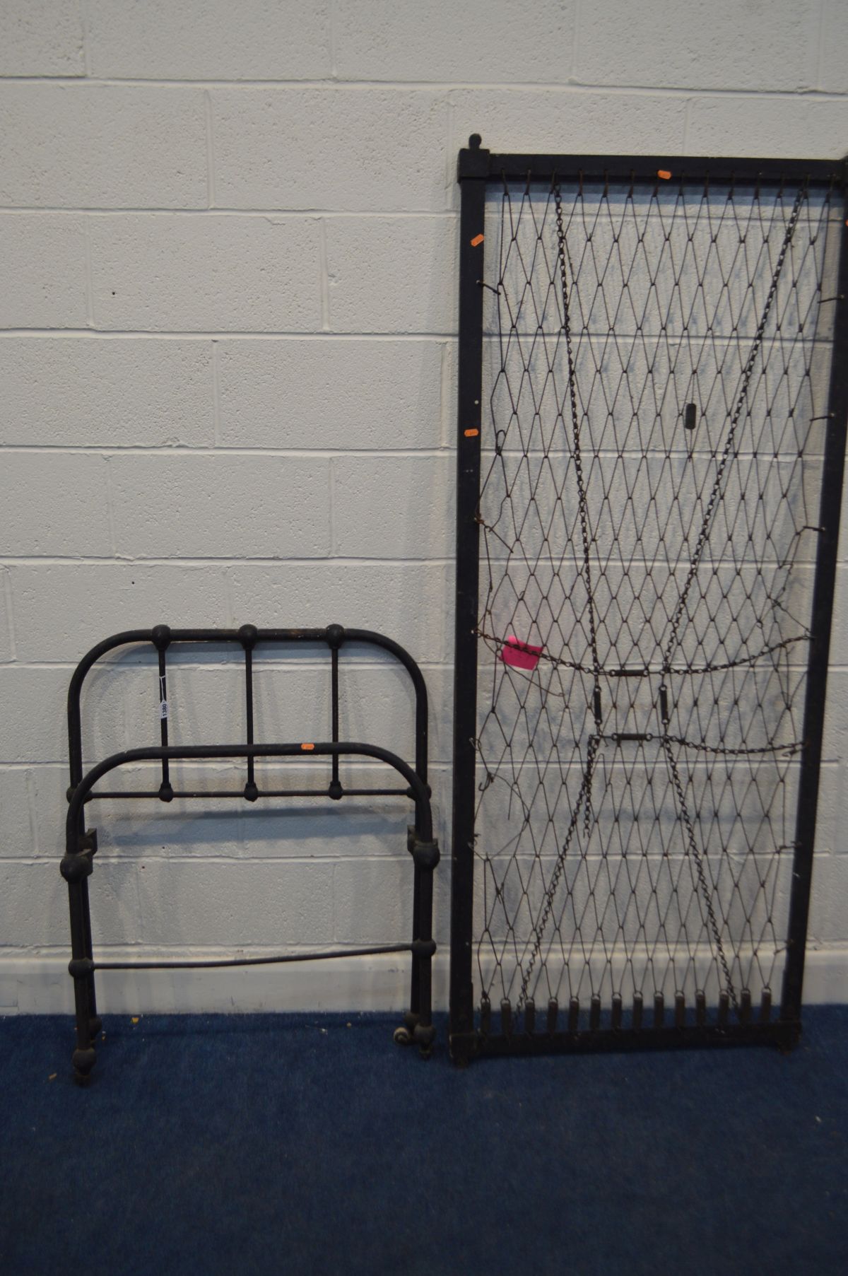 A VINTAGE TUBULAR METAL SINGLE BED FRAME with a spring base