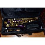 A CASED JOLLYSUN BY INTERNATIONAL ENGINEERING SAXOPHONE, in brass and metallic purple finish,