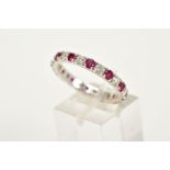 A MODERN RUBY AND DIAMOND FULL ETERNITY RING, estimated total diamond weight 0.84ct, colour assessed