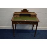 AN EDWARDIAN MAHOGANY, CROSSBANDED AND STRUNG LADIES DESK, green leather inlay top, and four