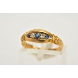 AN 18CT GOLD SAPPHIRE AND DIAMOND BOAT RING, set with three circular cut sapphires interspaced