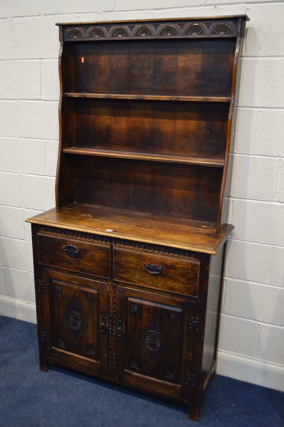 AN EARLY TO MID 20TH CENTURY OAK DRESSER, with narrow top above a base with two drawers and double