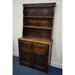 AN EARLY TO MID 20TH CENTURY OAK DRESSER, with narrow top above a base with two drawers and double