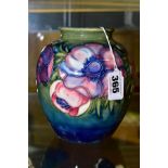 A MOORCROFT POTTERY VASE, 'Anemone' pattern on green/blue ground, impressed backstamp and painted