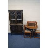 AN OAK BARLEY TWIST DROP LEAF TABLE, four chairs (sd) a brown buttoned leather footstool on an oak