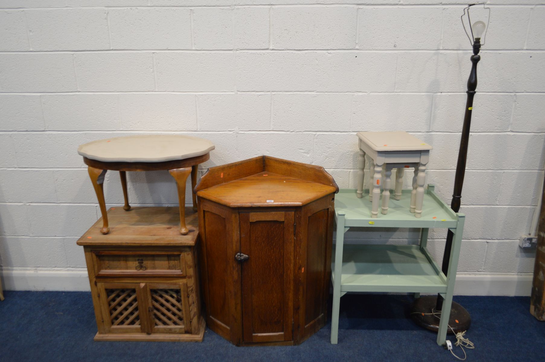 AN EARLY 20TH CENTURY OAK PANELLED SINGLE DOOR CORNER UNIT, together with a pine single drawer