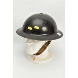 A WWII ERA, CIVIL DEFENCE STYLE 'JSS' 1939 DATED BLACK STEEL HELMET DATED 1939, with stretch