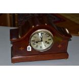 A MAHOGANY DOME TOPPED MANTEL CLOCK with silvered dial, Badische movement, runs and chimes briefly