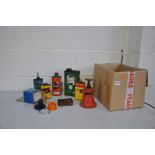 A COLLECTION OF VINTAGE OIL CANS, a bottle jack and an Austin Rover indicator lamp (8)