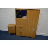 A MID 20TH CENTURY LEBUS OAK TWO PIECE BEDROOM SUITE, comprising a gentleman's wardrobe, width 112cm