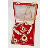AN ASIAN SUITE OF JEWELLERY, to include a long fancy necklace, ear pendants and ring, each piece