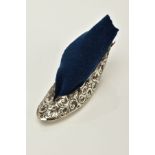 A GEORGE V SILVER PIN CUSHION, in the form of a floral embossed show, blue velvet inlayed cushion,