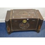 AN ORIENTAL CAMPHORWOOD CHEST, with carved decoration to top and front depicting maritime scenes (