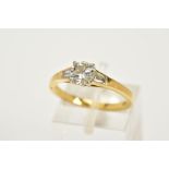 AN 18CT GOLD SINGLE STONE DIAMOND RING, designed with a central round brilliant cut diamond,