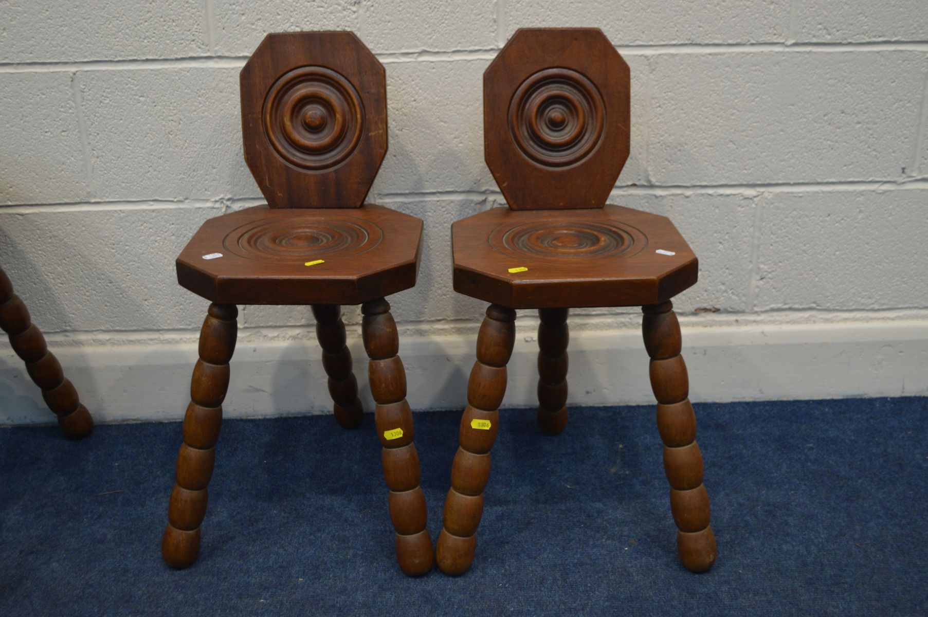 A PAIR OF MID TO LATE 20TH CENTURY MAHOGANY SPINNING CHAIRS together with a matching circular - Image 2 of 2