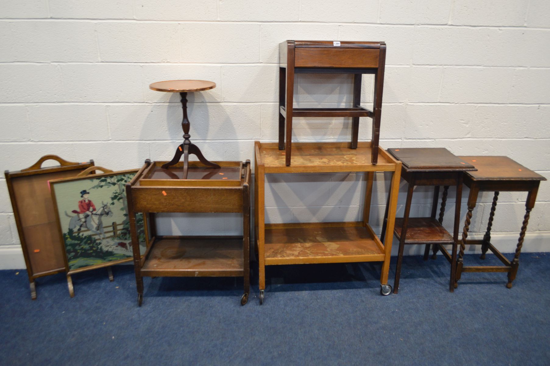 A QUANTITY OF OCCASIONAL FURNITURE, to include two oak occasional tables, two tea trolleys, two fire