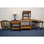 A QUANTITY OF OCCASIONAL FURNITURE, to include two oak occasional tables, two tea trolleys, two fire