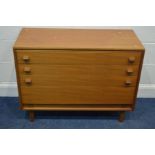 A LOW MID 20TH CENTURY TEAK CHEST OF FOUR LONG GRADUATED DRAWERS, internal label reading