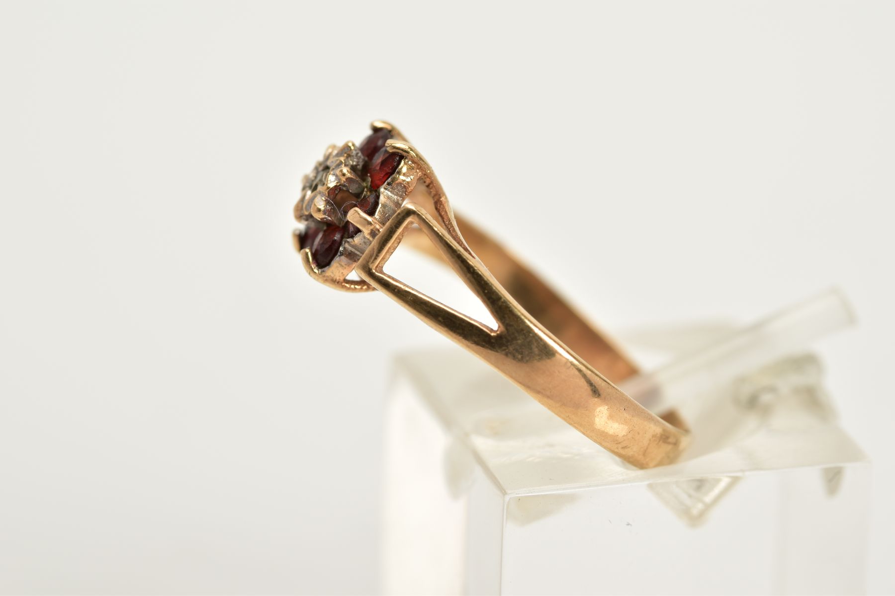 A 9CT GOLD GARNET AND DIAMOND CLUSTER RING, designed with a central single cut diamond, circular cut - Image 2 of 3