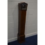 AN ART DECO WALNUT GRANDDAUGHTER CLOCK, with a Westminster chime, height 152cm (winding key and