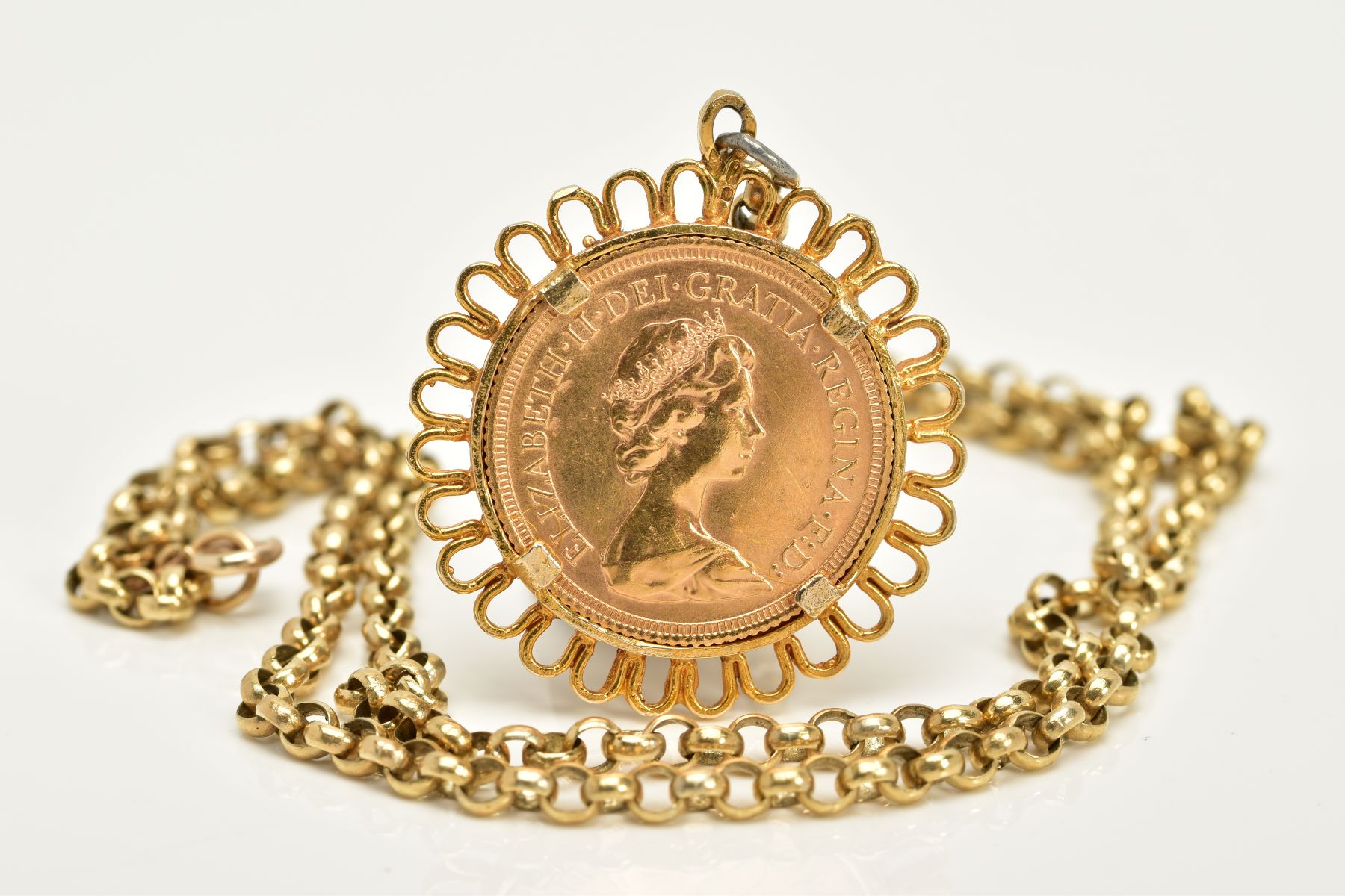 A 1979 FULL SOVEREIGN MOUNTED AS A PENDANT ON CHAIN, within a collet mount and scallop edge - Image 3 of 4