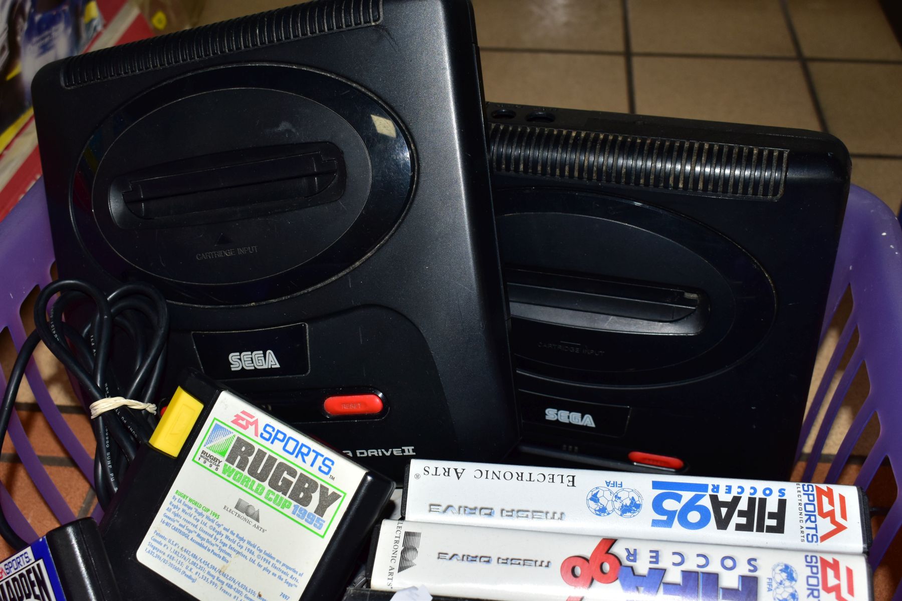 TWO TRAYS, containing Sony Playstation. two controllers and games, two Sega/Mega Drive II machines - Image 4 of 4