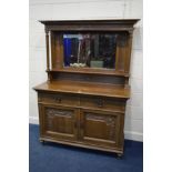 AN EARLY 20TH CENTURY ARTS AND CRAFTS OAK MIRRORBACK SIDEBOARD, with two drawers above double