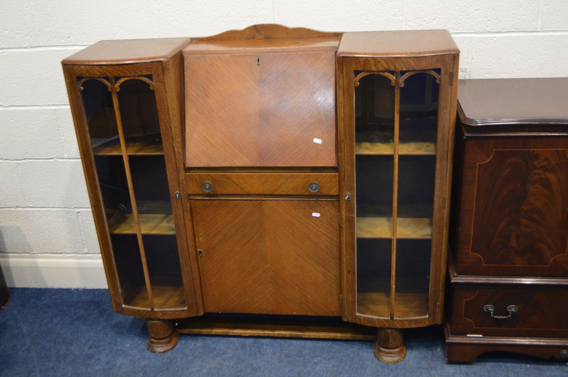 AN EARLY TO MID 20TH CENTURY OAK SIDE BY SIDE BUREAU, with fall front above a single drawer and - Image 2 of 3