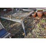 A MODERN METAL FRAMED GARDEN TABLE with frosted glass top, length 186cm x width 110cm x height 76cm