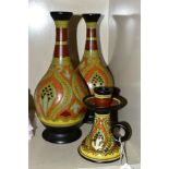 GOUDA POTTERY IN THE PLATO PATTERN to include a pair of baluster vases, approximate height 28cm,