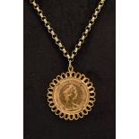 A 1979 FULL SOVEREIGN MOUNTED AS A PENDANT ON CHAIN, within a collet mount and scallop edge