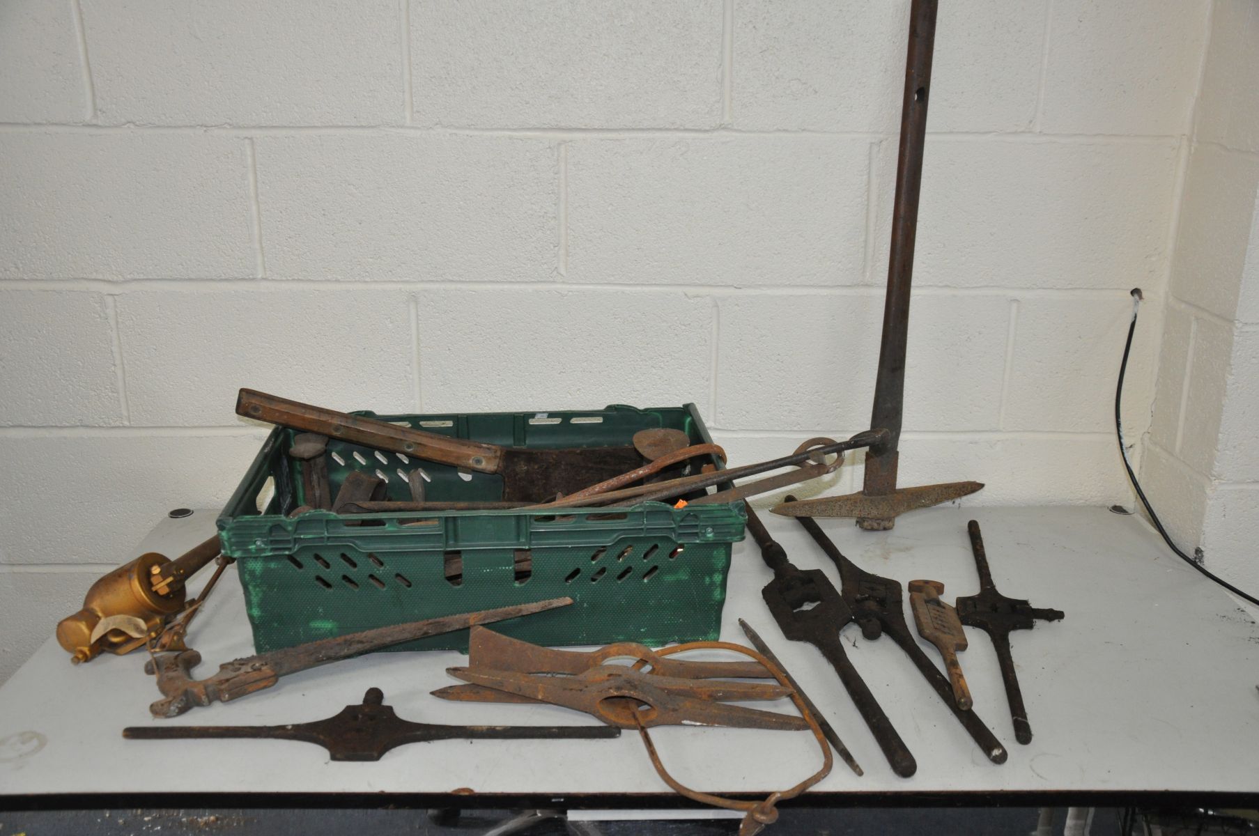 A TRAY CONTAINING VINTAGE TOOLS, door furniture, and fire furniture, including tap wrenches, show