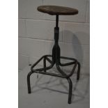 A VINTAGE REGMA INDUSTRIAL SWIVEL TOP STOOL