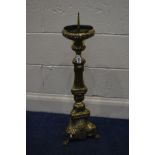 A BRASS ECCLESIASTICAL CANDLE STAND, height 78cm
