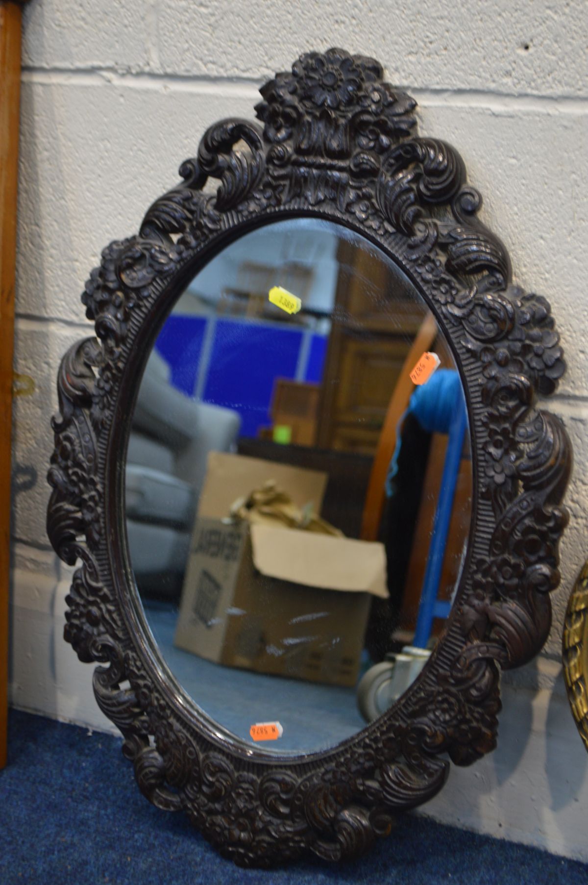 A MODERN GILT FRAMED OVAL WALL MIRROR, together with a carved ebonised wood wall mirror and two - Image 2 of 2