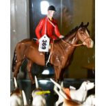 A BESWICK HUNTSMAN, No 1501, brown horse