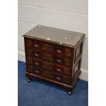 A SMALL REPRODUCTION HARDWOOD AND FOLIATE BRASS INLAID CHEST OF FOUR DRAWERS, width 61cm x depth