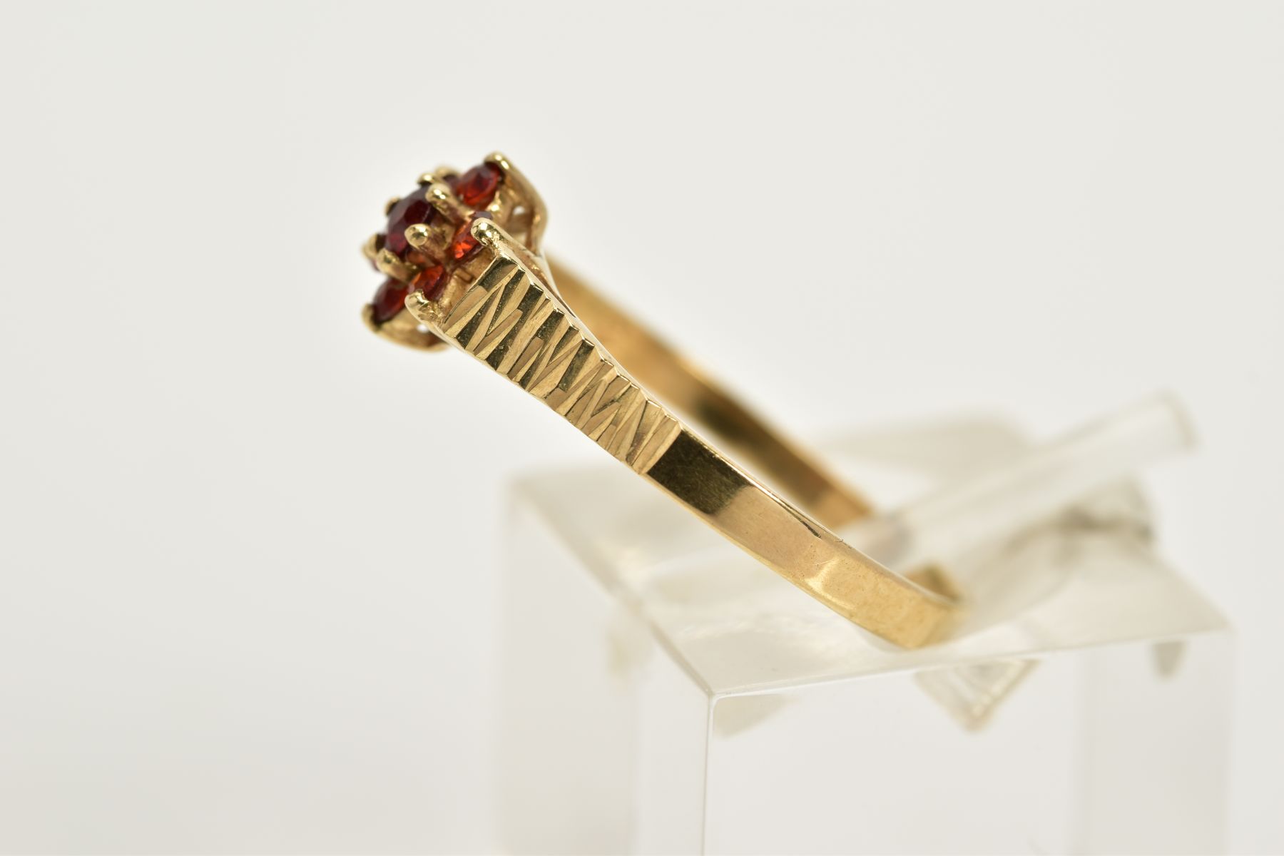 A 9CT GOLD GARNET CLUSTER RING, designed with a small central cluster set with seven circular cut - Image 2 of 3