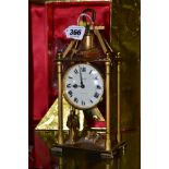 A BOXED SWISS IMHOF GILT METAL MANTEL CLOCK, with a monk automation ringing the bell, another monk