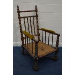 A 19TH CENTURY OAK BOBBIN TURNED THRONE CHAIR, with a cross stretchered base