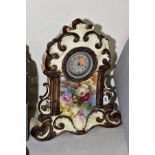 A LATE VICTORIAN POTTERY CASED MANTEL CLOCK OF SCROLLED OUTLINE, cream ground with brown details and
