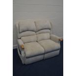 A CREAM ELECTRIC TWO SEATER SOFA (missing one battery pack, PAT pass and working )