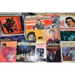A BOX OF OVER 30 LP'S, by artists such as Jerry Lee lewis, Buddy Holly, Beach Boys, The Smiths,