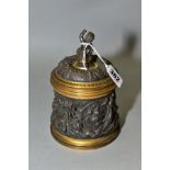 A LATE 19TH/EARLY 20TH CENTURY GILT METAL AND BRONZED TOBACCO JAR AND COVER, cast with foliate