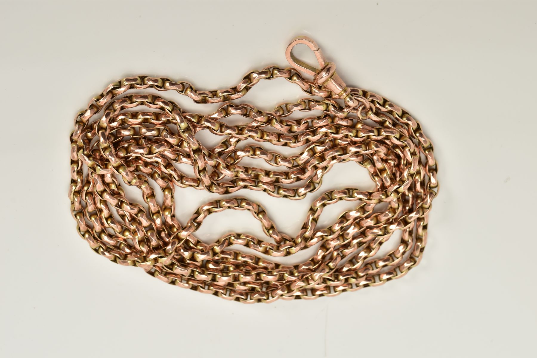 A YELLOW METAL CHAIN, a curb link chain stamped 9ct, fitted to a lobster claw clasp, stamped 9ct,