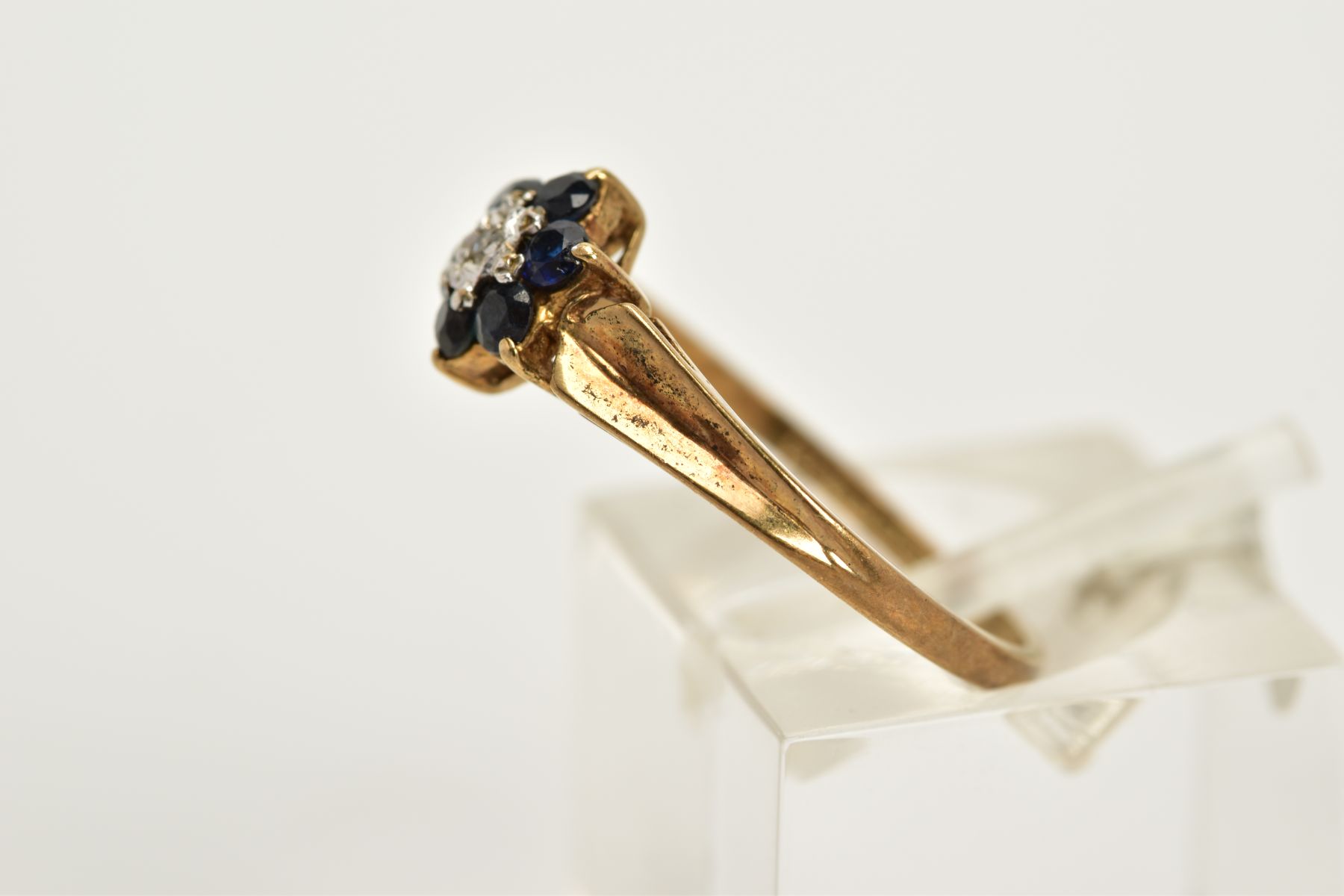 A 9CT GOLD SAPPHIRE AND DIAMOND CLUSTER RING, designed with a central single cut diamond, circular - Image 2 of 3