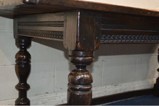 AN 18TH CENTURY OAK REFECTORY TABLE, a triple plank top, above a carved frieze, on turned and - Image 3 of 3