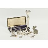 A SELECTION OF SILVER ITEMS to include a single square based candlestick, hallmarked Birmingham