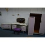 A CREAM AND PINK PAINTED G-PLAN TOLA AND BLACK THREE PIECE BEDROOM SUITE, comprising a triple door