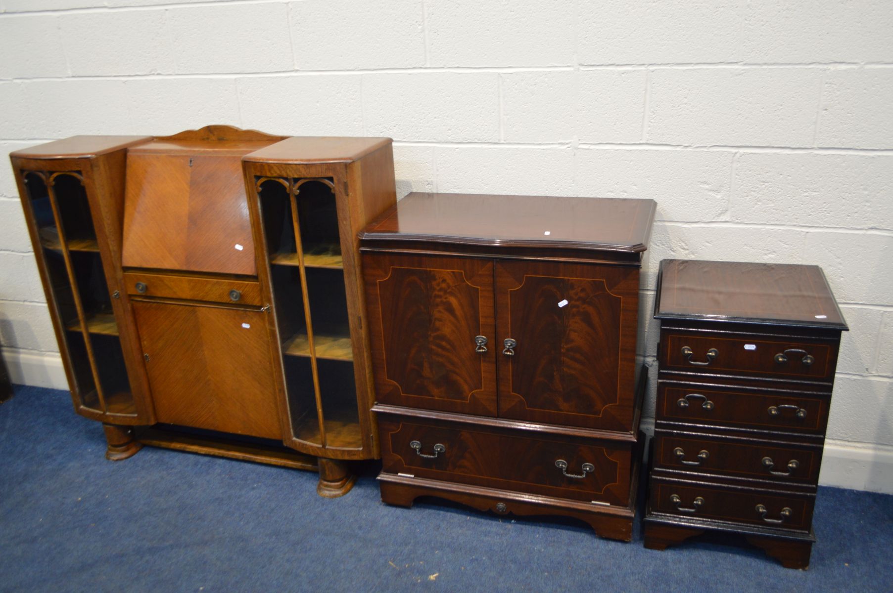 AN EARLY TO MID 20TH CENTURY OAK SIDE BY SIDE BUREAU, with fall front above a single drawer and